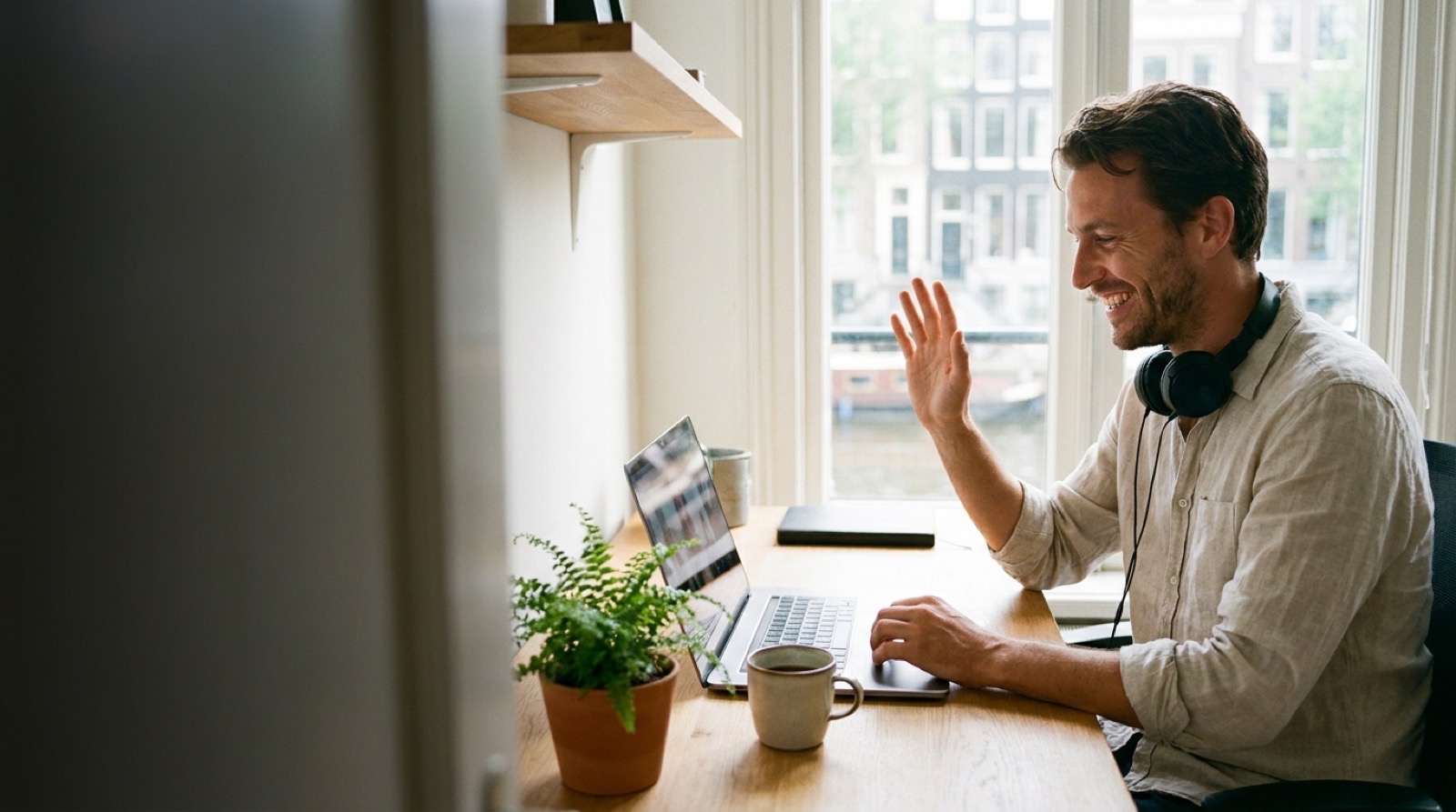 A welcoming first meeting at a canal-side office table